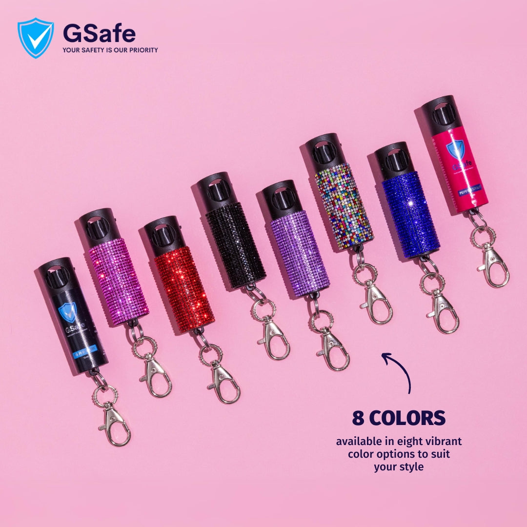 GSafe pepper spray available in 8 color options, including Plain Black, Plain Pink, and Rhinestone designs for everyday personal safety.